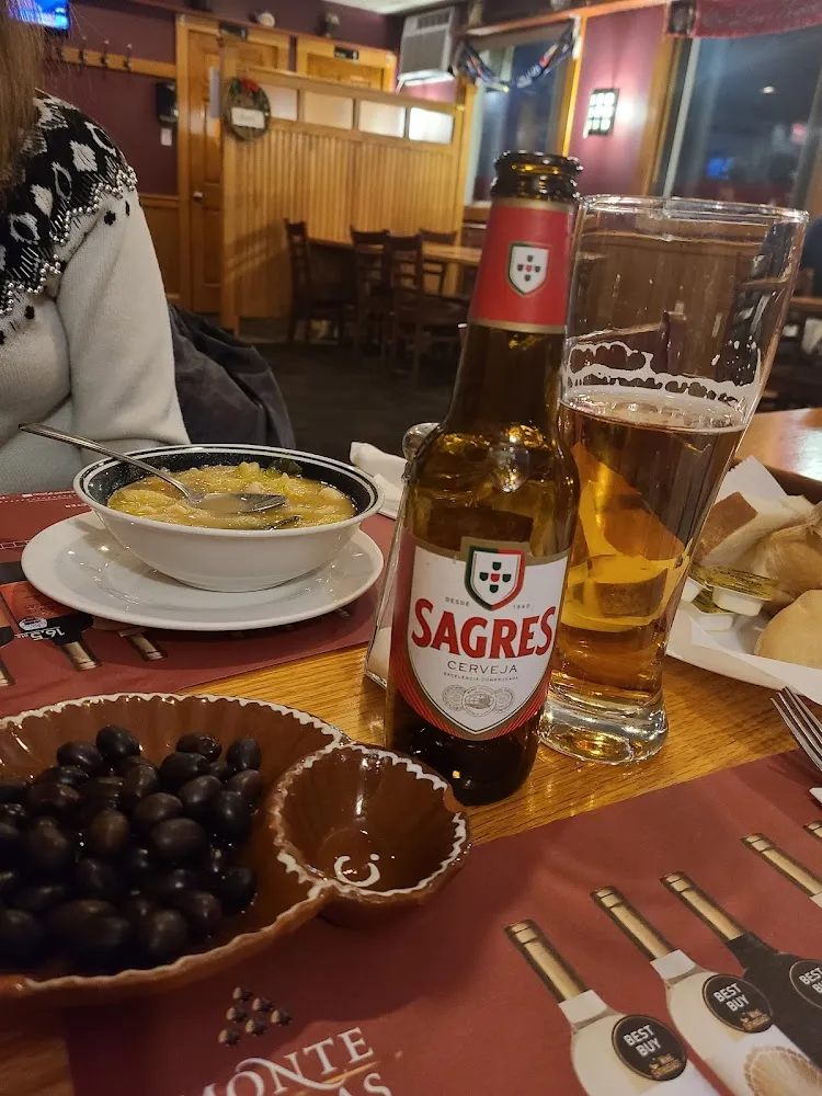 Linguisa and House Soup for Appetizers Bread with Butter and Portuguese Olives